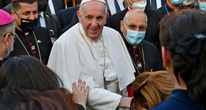 Pope Francis visits Iraqi Christians who suffered under IS