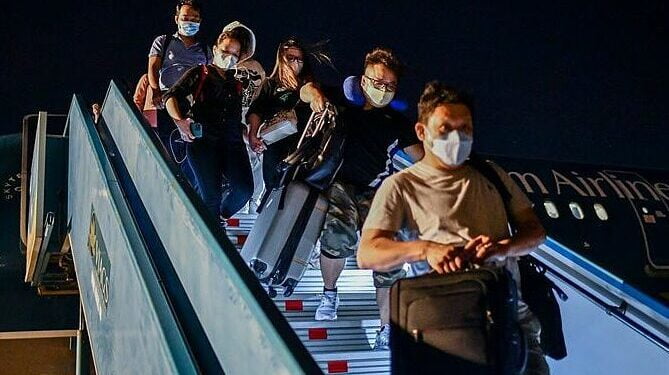 Do the leg-work, be patient: foreigners on flying back to Vietnam