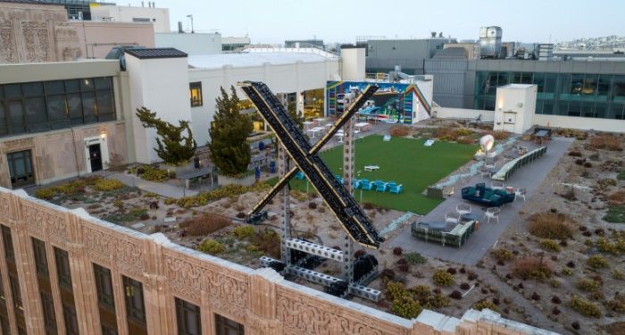 Musk removes giant, flashing X sign after furore